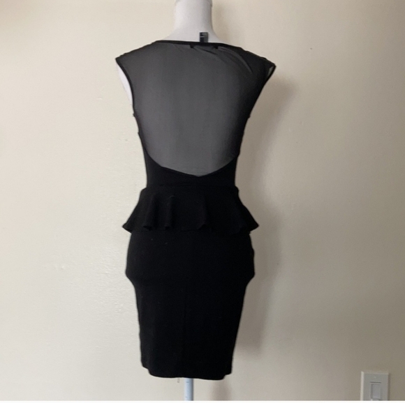 Peplum dress with short  sleeves and sheer bodice - Picture 2 of 11